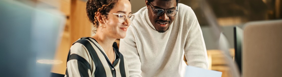two persons and a PC
